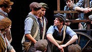 Corey Cott and the newsboys in Newsies.