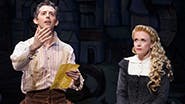 John Grisetti as Nigel Bottom and Catherine Brunell as Portia in Something Rotten