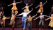 Hugh Jackman as Harold Hill and the cast of The Music Man