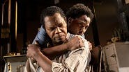 Samuel L. Jackson as Doaker Charles and John David Washington as Boy Willie in The Piano Lesson